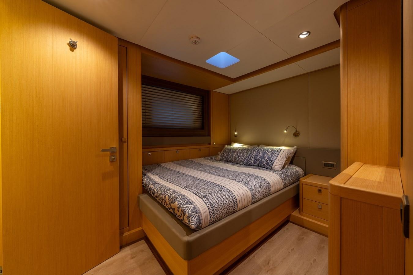 a bed in a room aboard JASMINA III Yacht for Sale