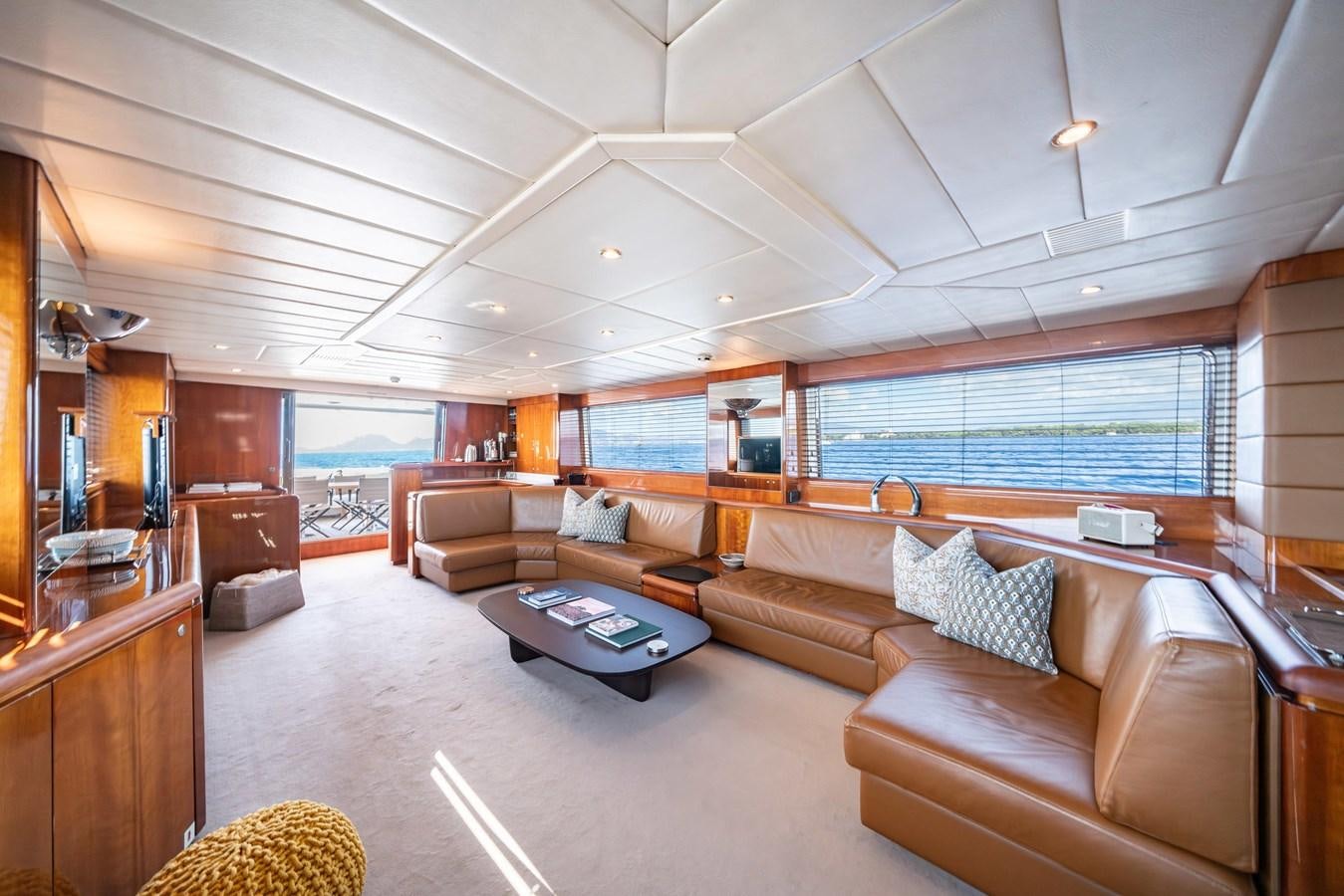 a living room with a large window aboard MOONRAKER II Yacht for Sale