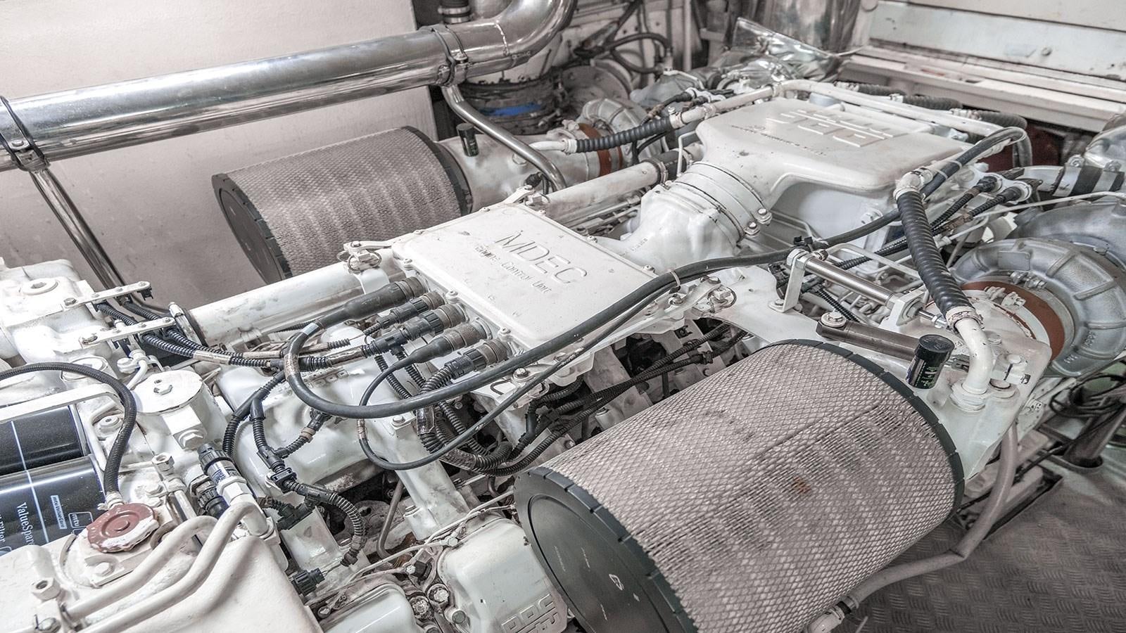 a car engine with a hood aboard TITAN Yacht for Sale