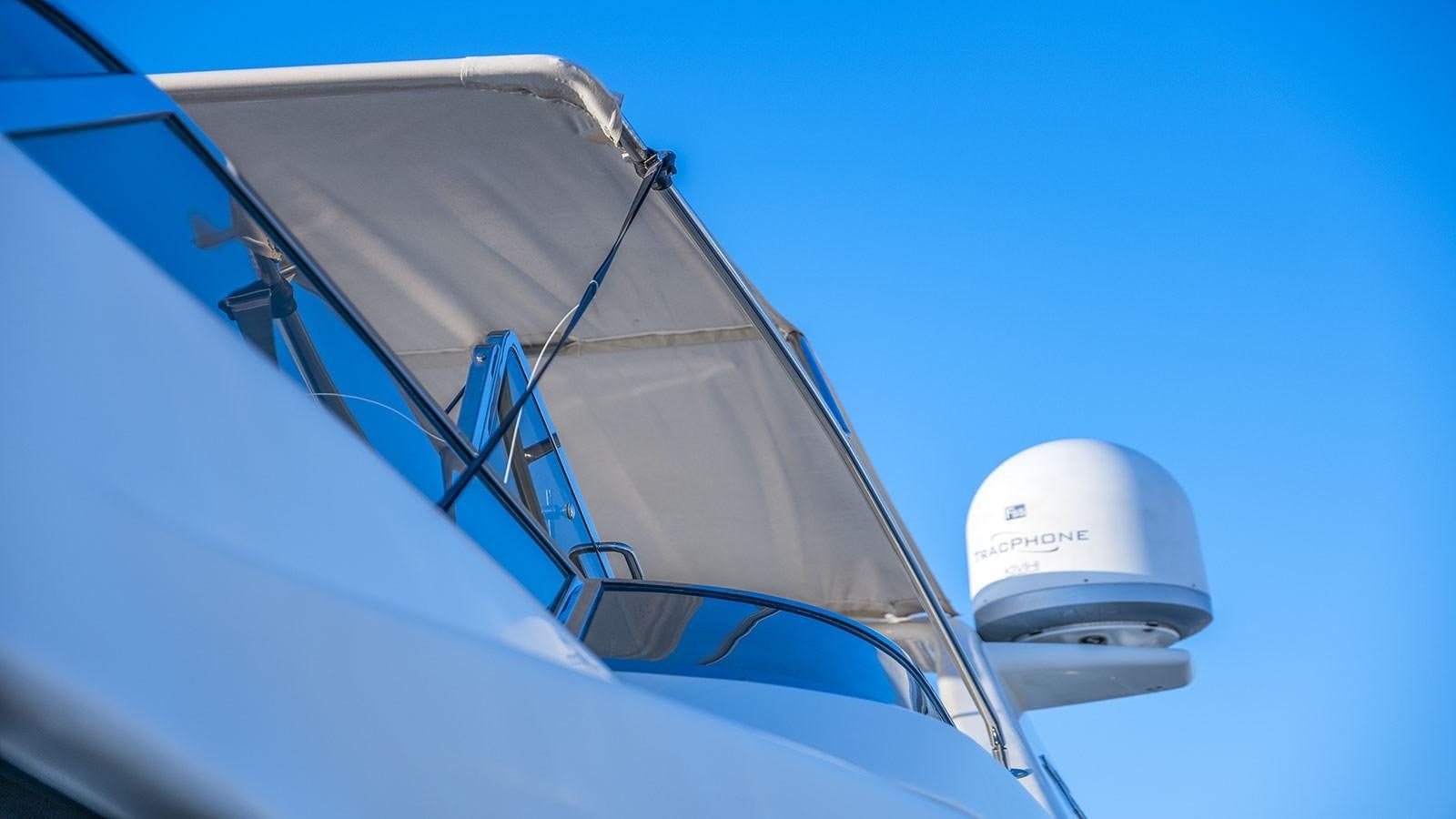 a close-up of a white yacht aboard TITAN Yacht for Sale