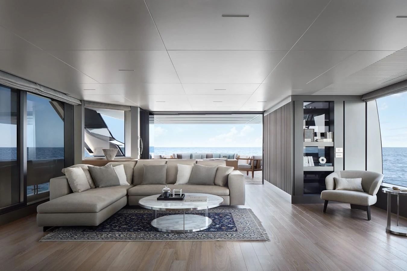a living room with a large window aboard STELLA Yacht for Sale