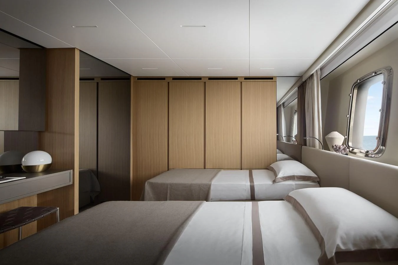 a room with a bed and a mirror aboard STELLA Yacht for Sale