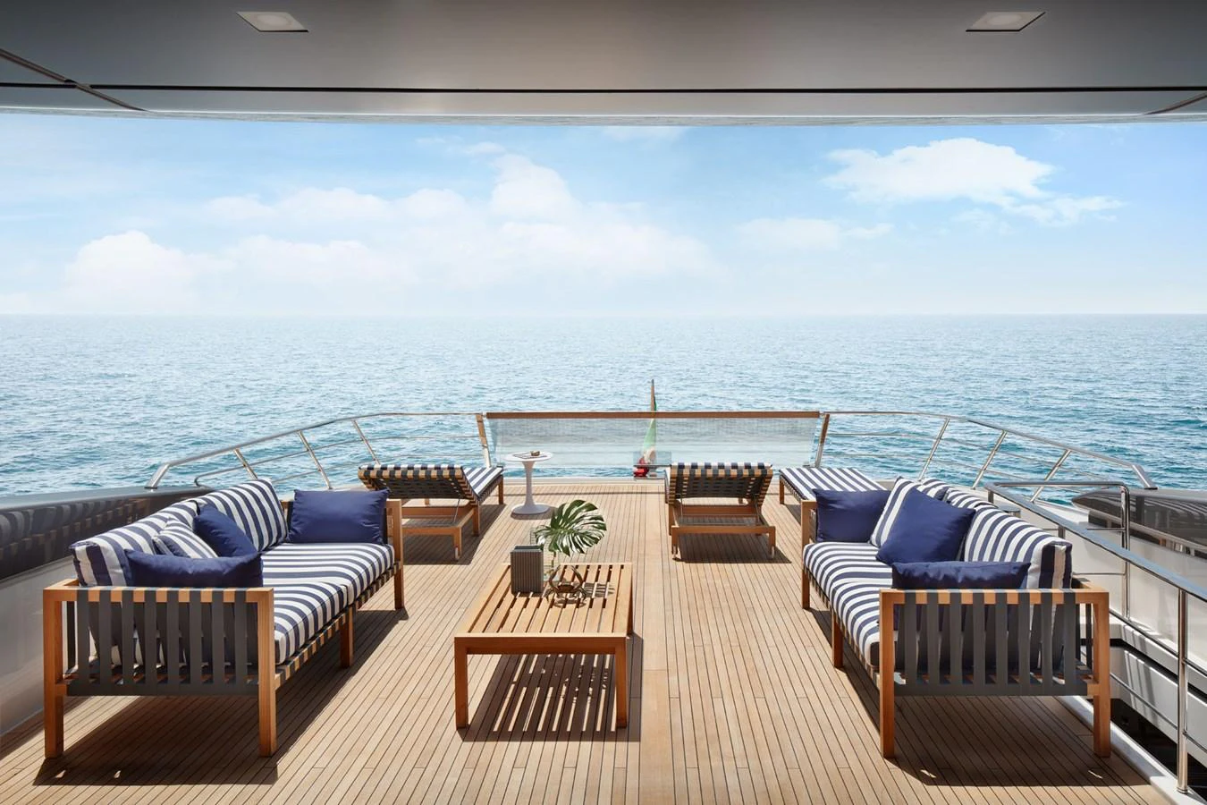 a deck with chairs and a large body of water aboard STELLA Yacht for Sale