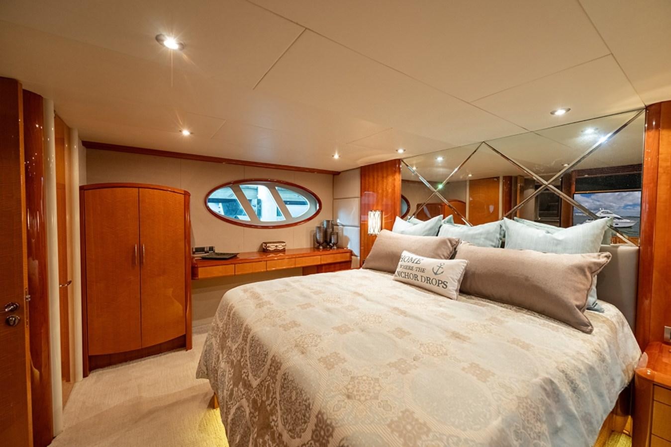a bed in a room aboard BODACIOUS VI Yacht for Sale