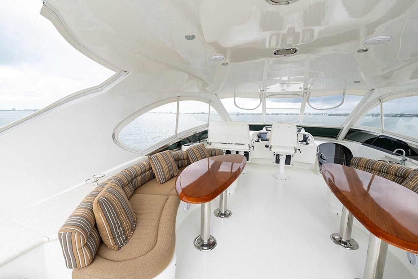 inside of a white yacht aboard BODACIOUS VI Yacht for Sale