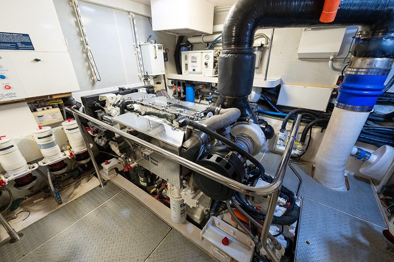a machine with a large metal pipe aboard BODACIOUS VI Yacht for Sale