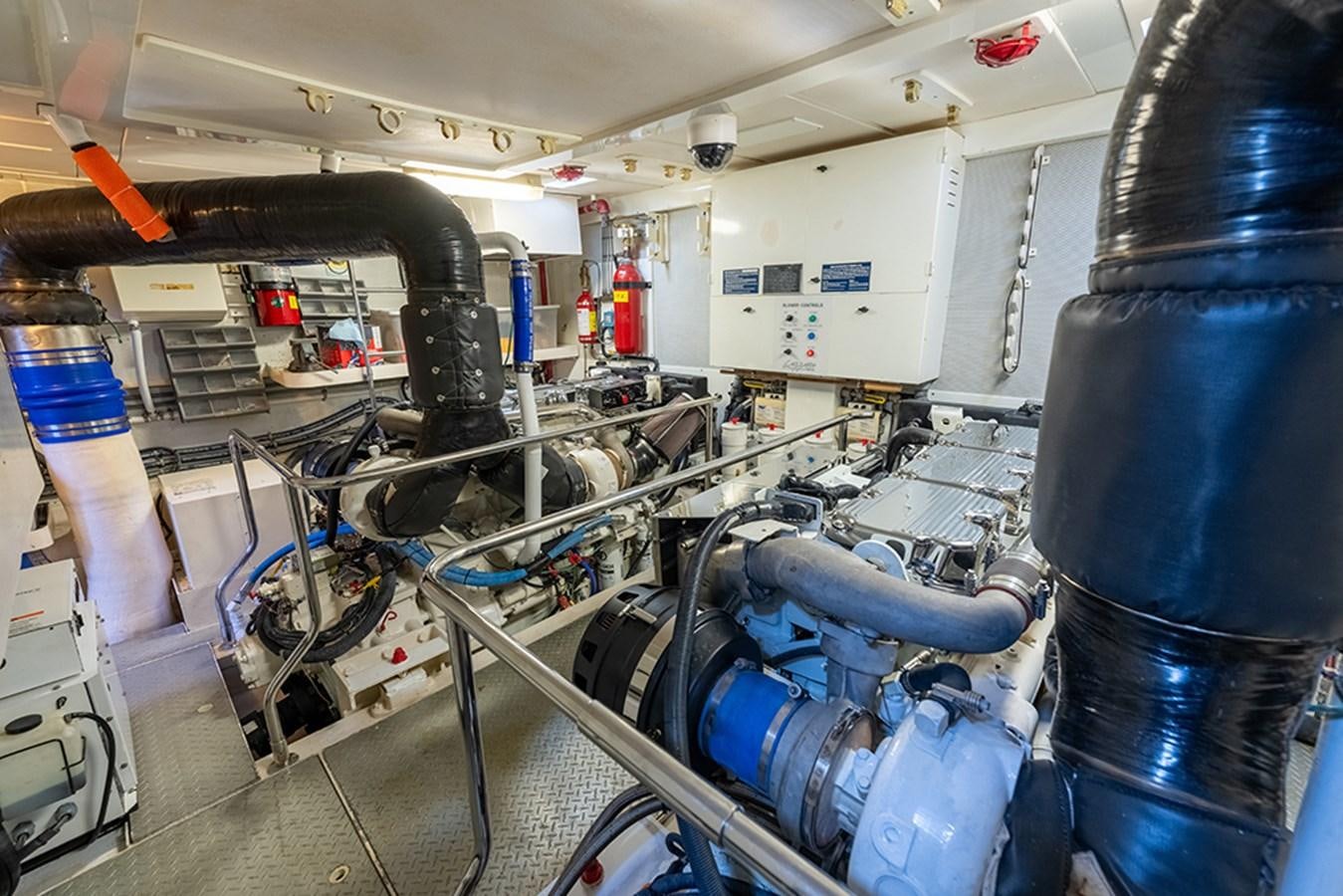 a room with machinery aboard BODACIOUS VI Yacht for Sale