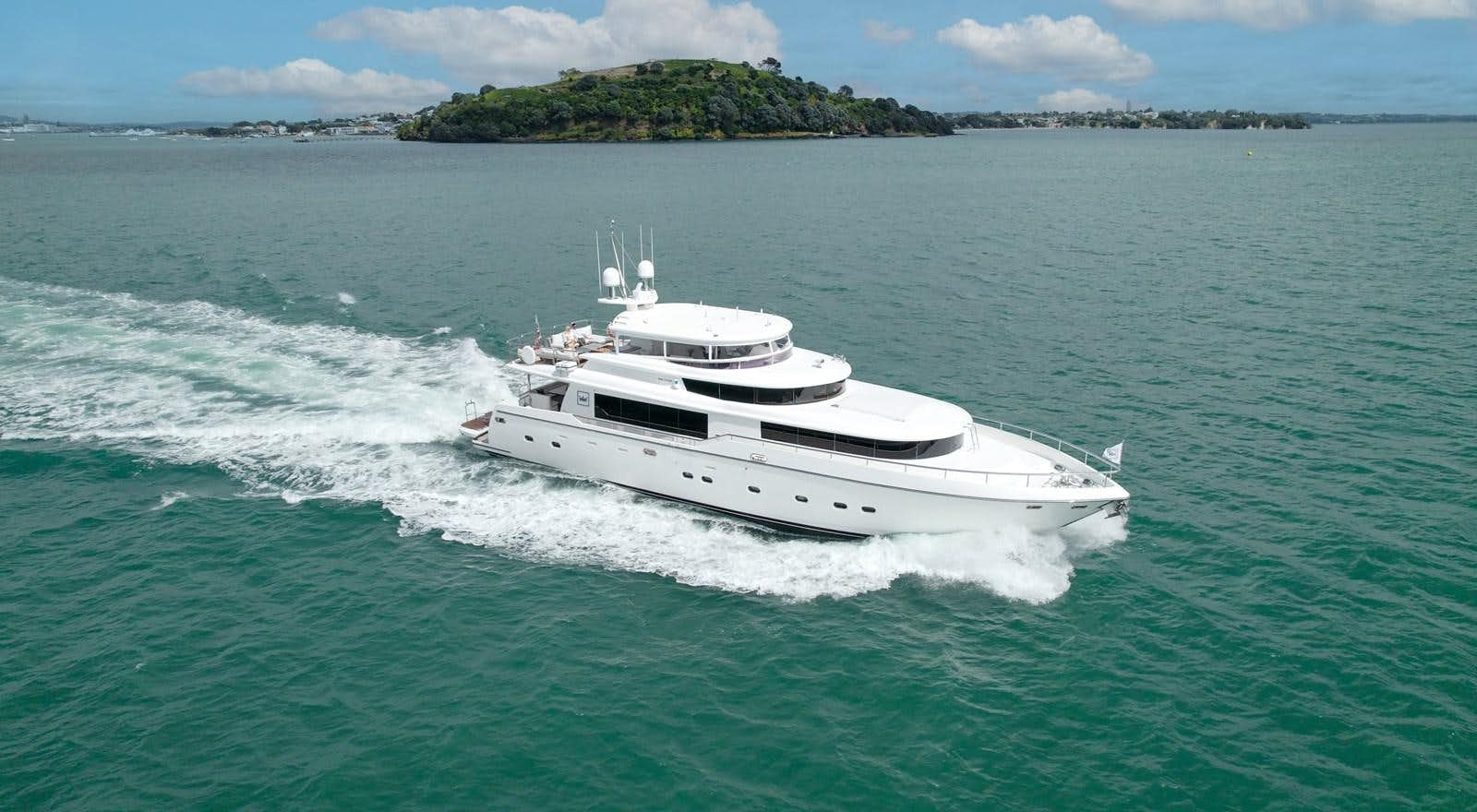 a white boat on the water aboard FITNAUTIC Yacht for Sale