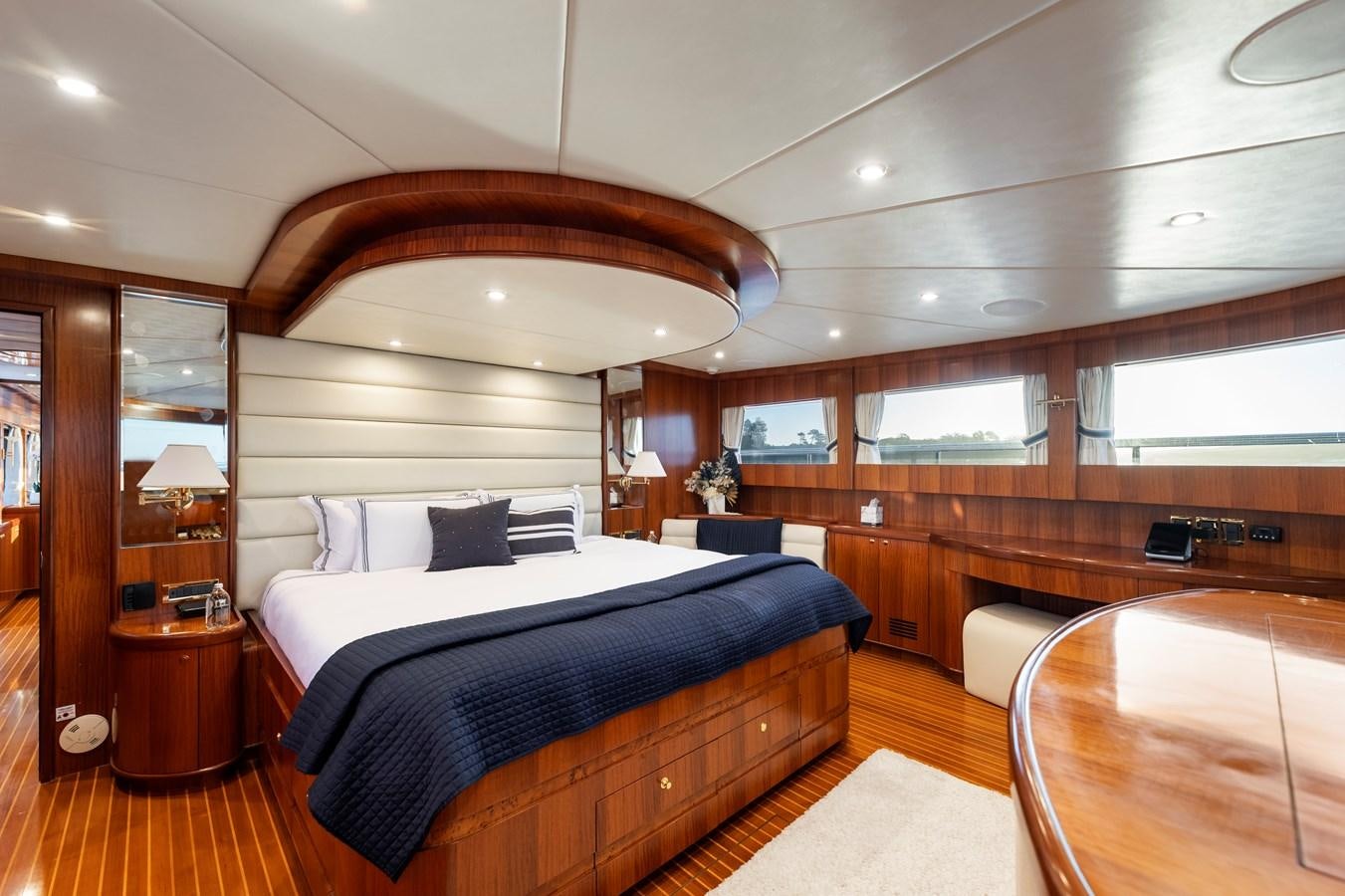 a large bedroom with a large bed aboard WW Yacht for Sale