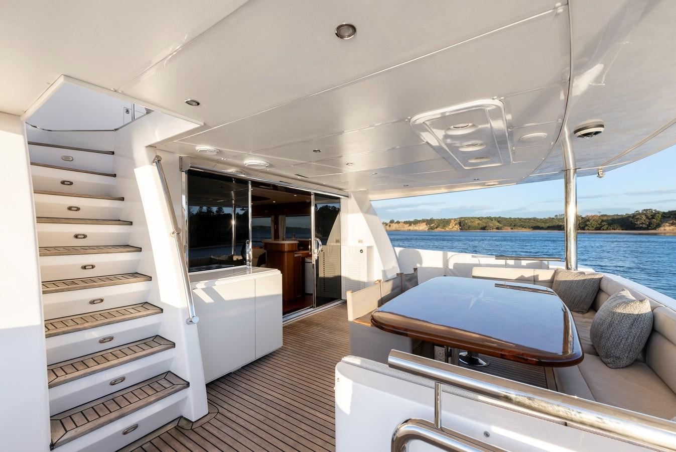 a boat with a bed and a large bed aboard WW Yacht for Sale