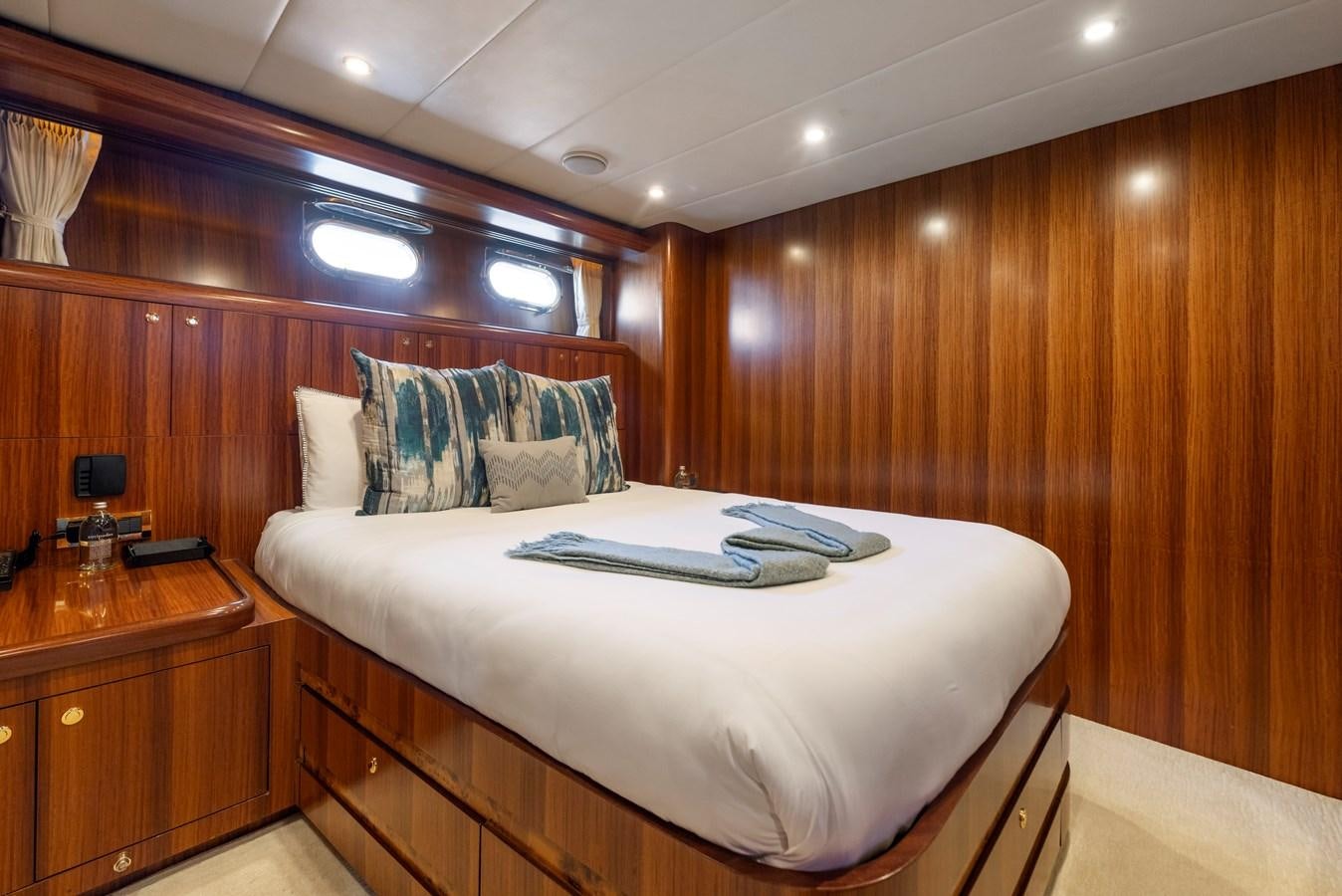 a bed in a room aboard WW Yacht for Sale