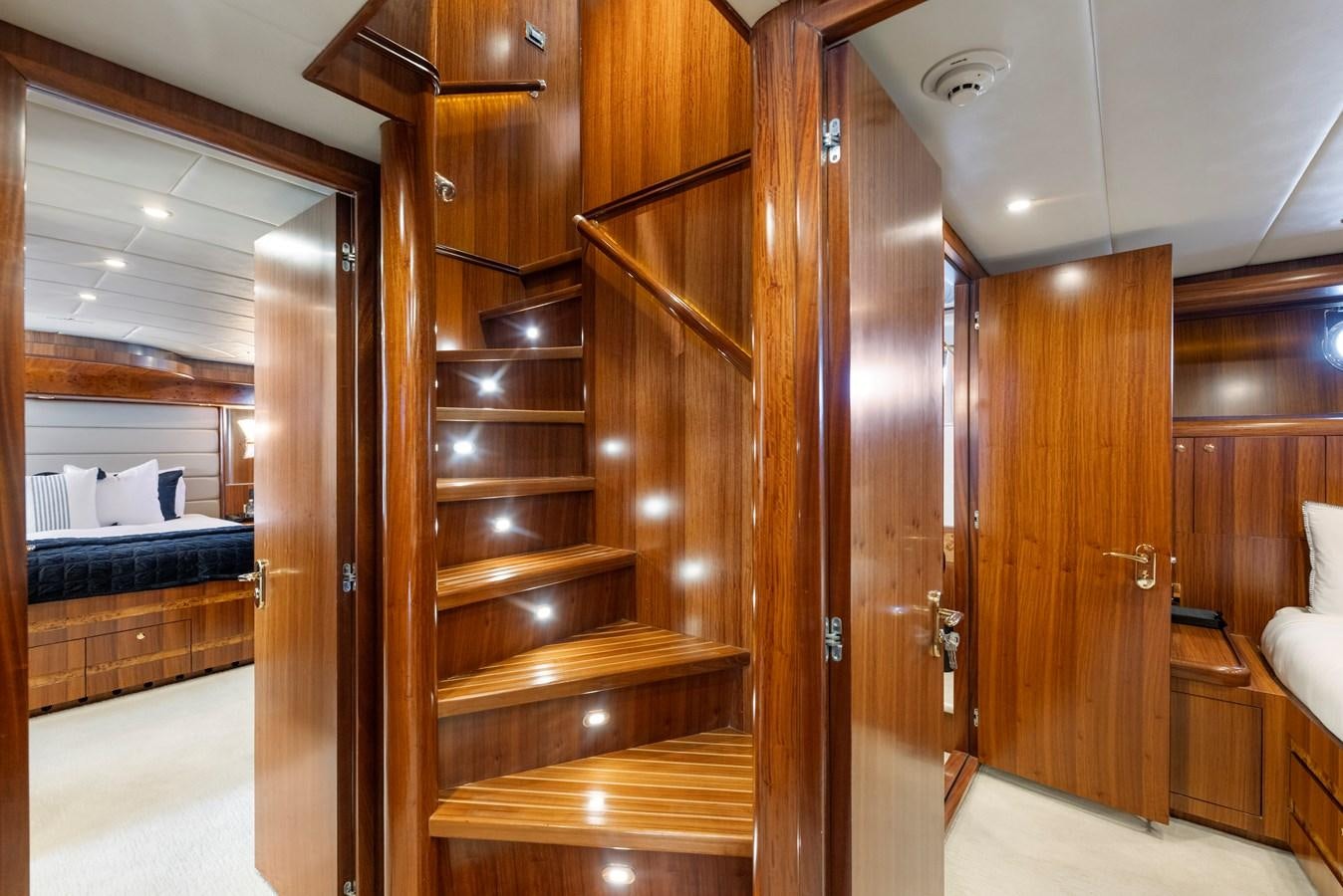 a room with wooden doors aboard WW Yacht for Sale