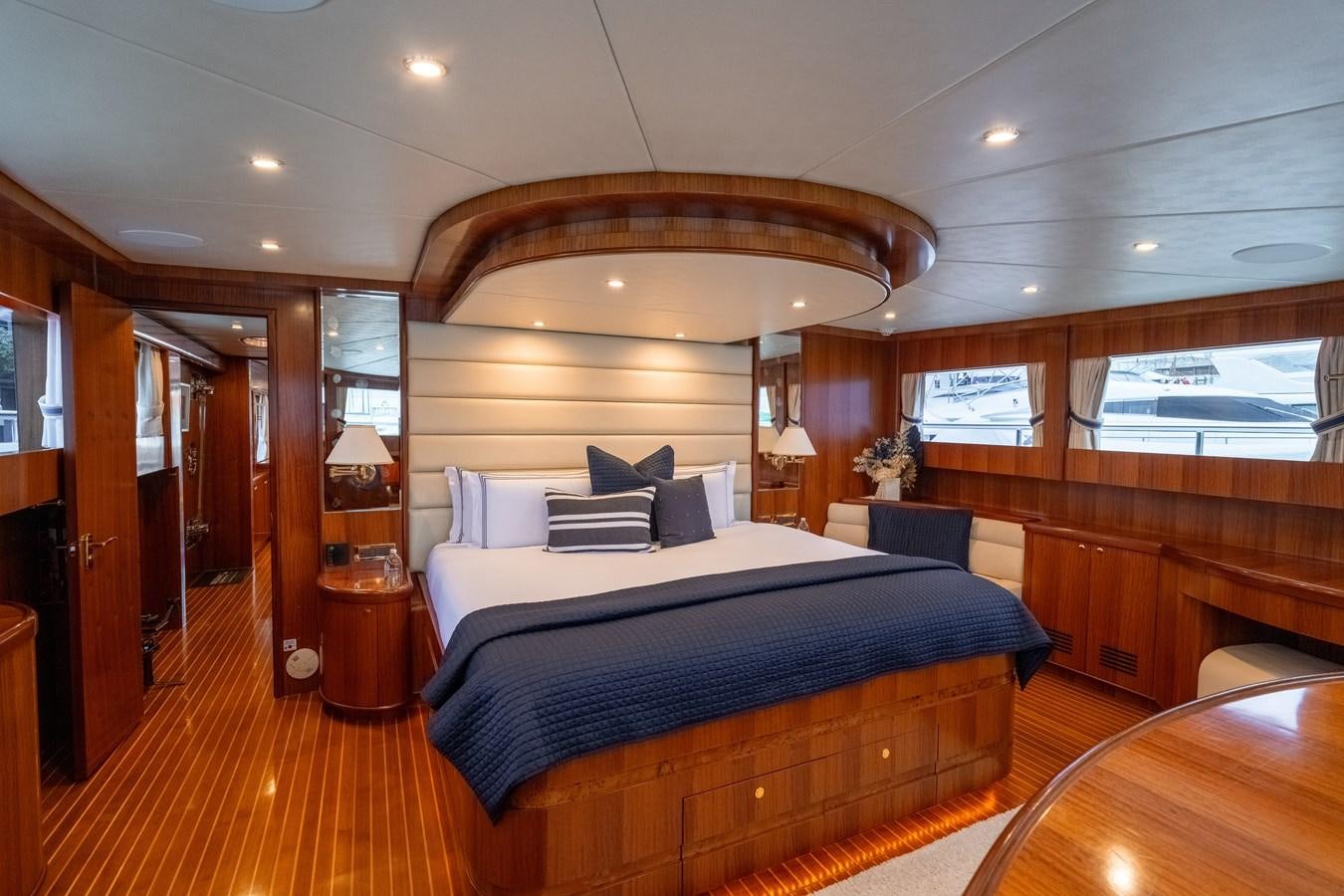 a large bedroom with a large bed aboard WW Yacht for Sale