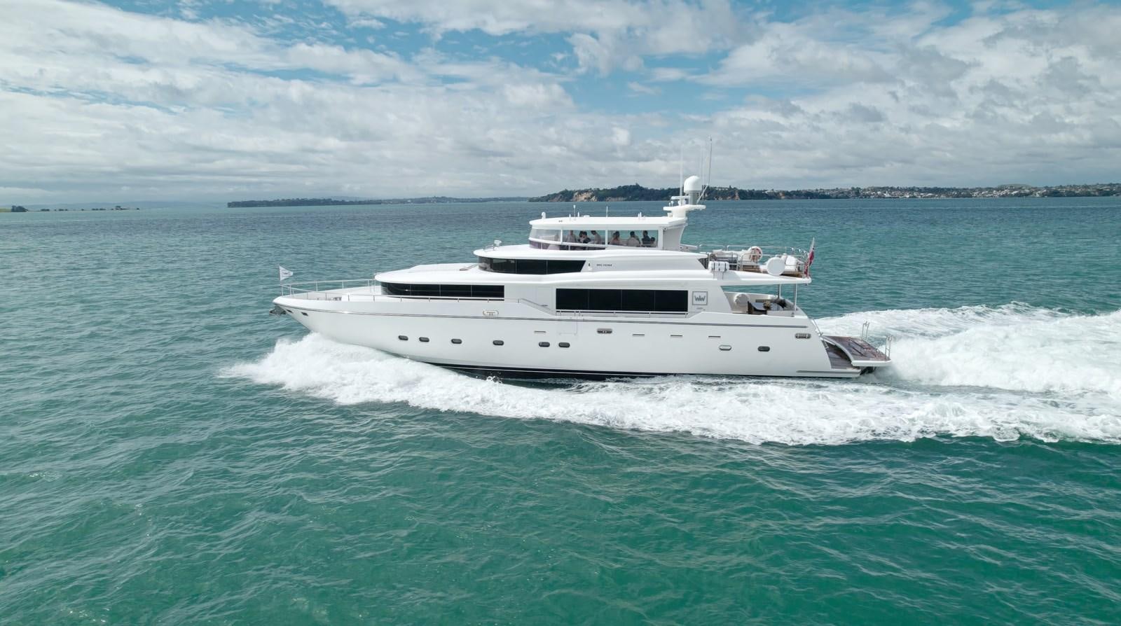 a white boat on the water aboard WW Yacht for Sale