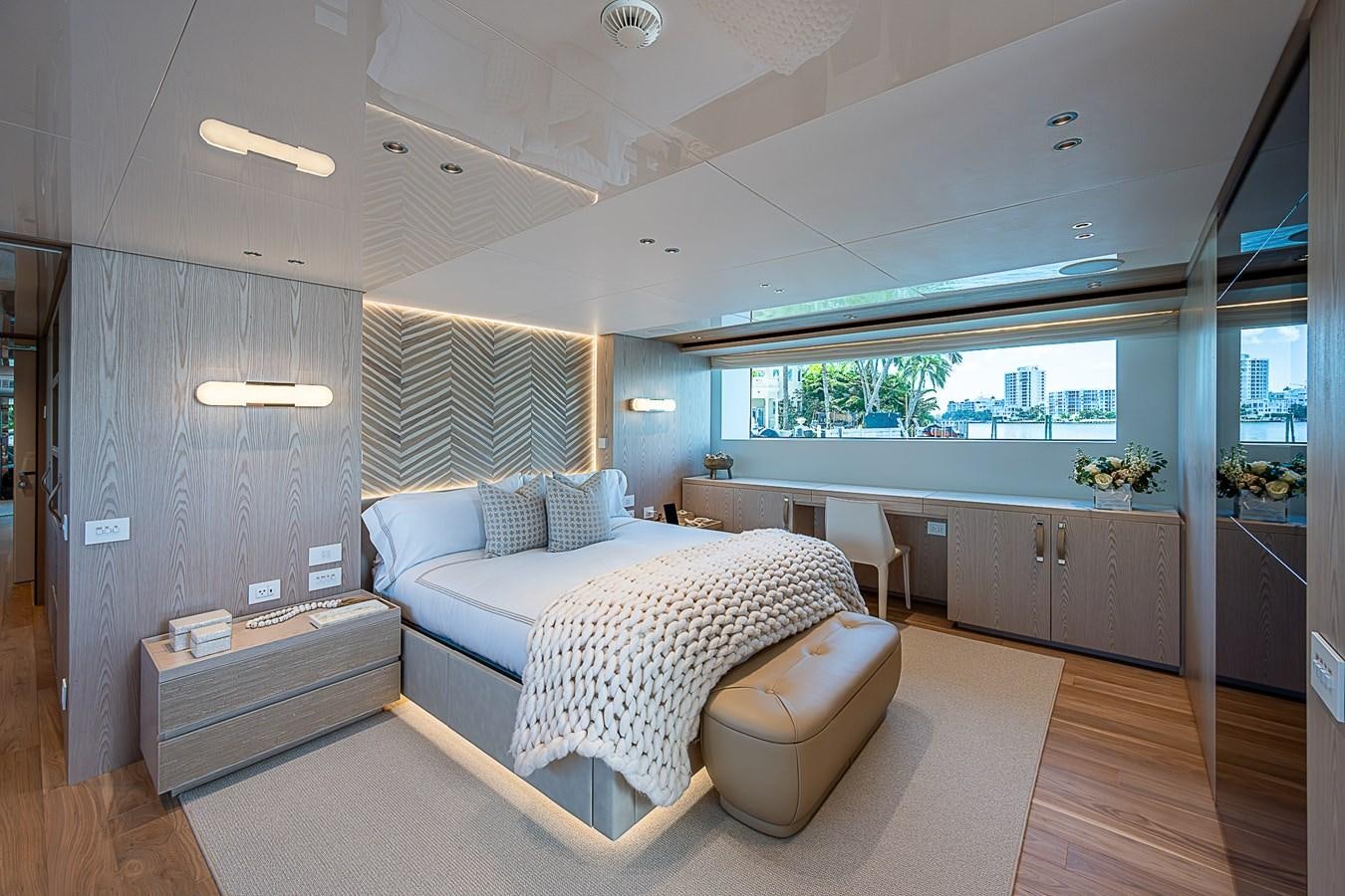 a bedroom with a large bed aboard F 118 Yacht for Sale