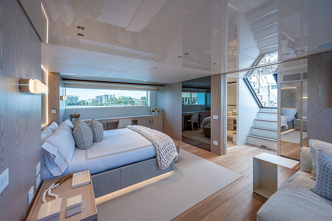 a room with a bed and a table aboard F 118 Yacht for Sale