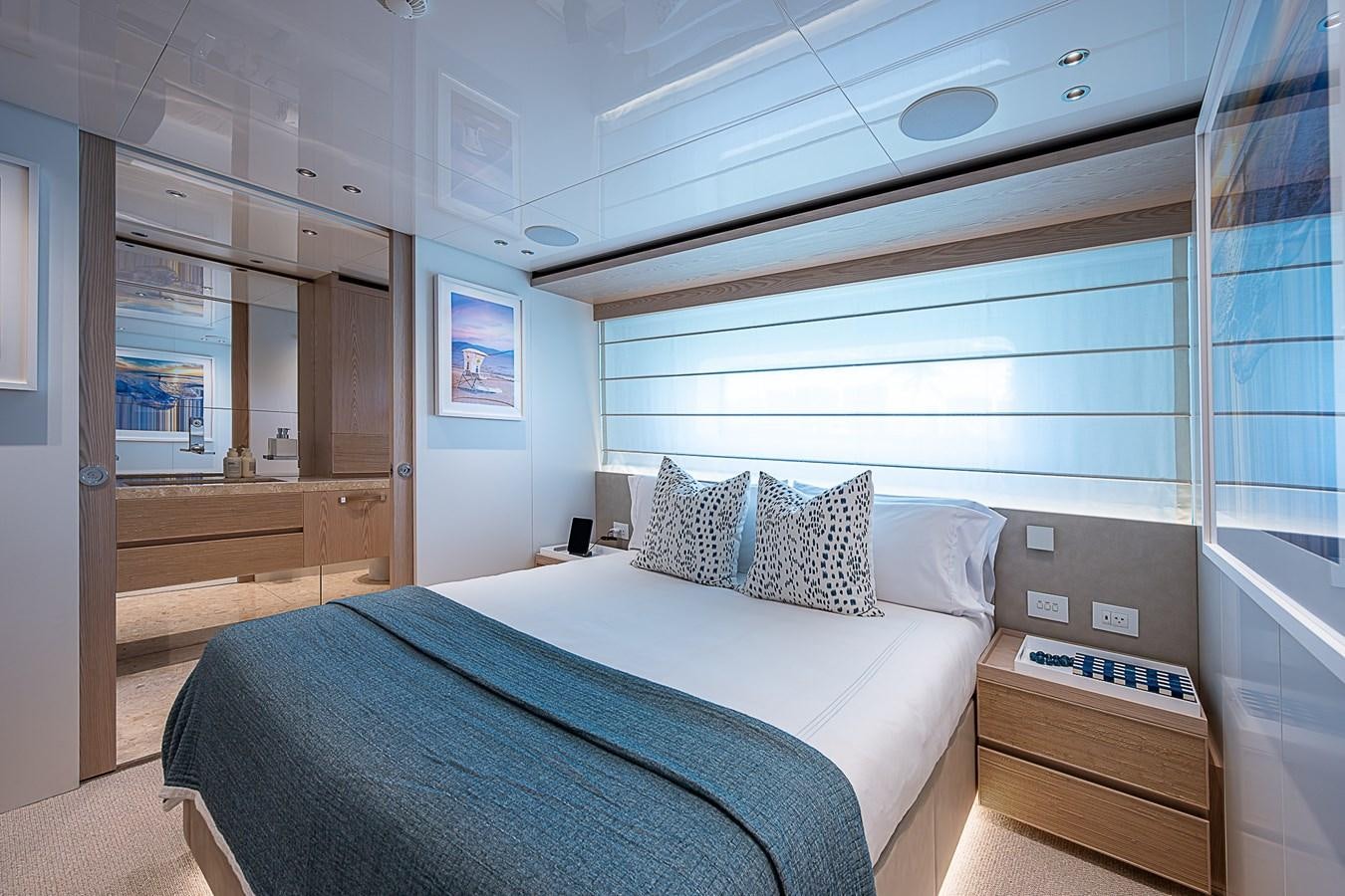 a bed in a room aboard F 118 Yacht for Sale
