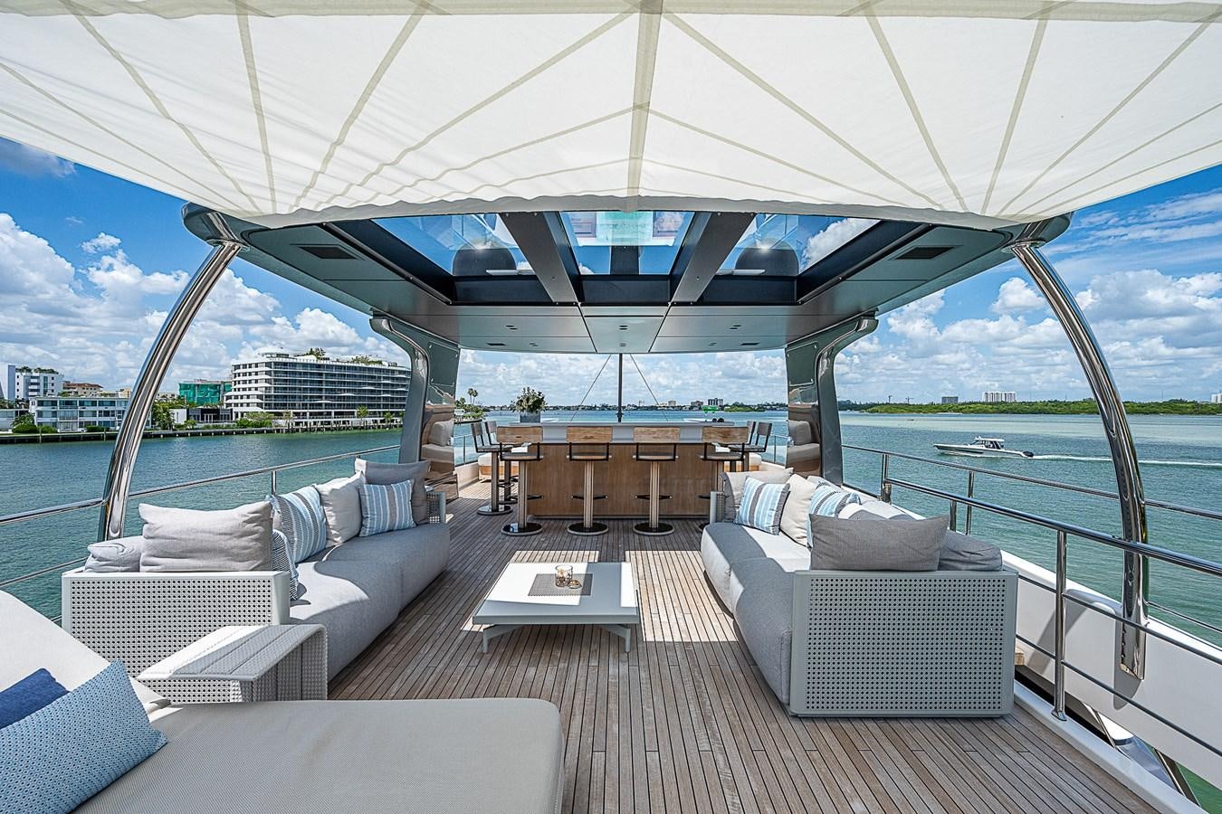 a large lounge area with a large patio and a large pool aboard F 118 Yacht for Sale