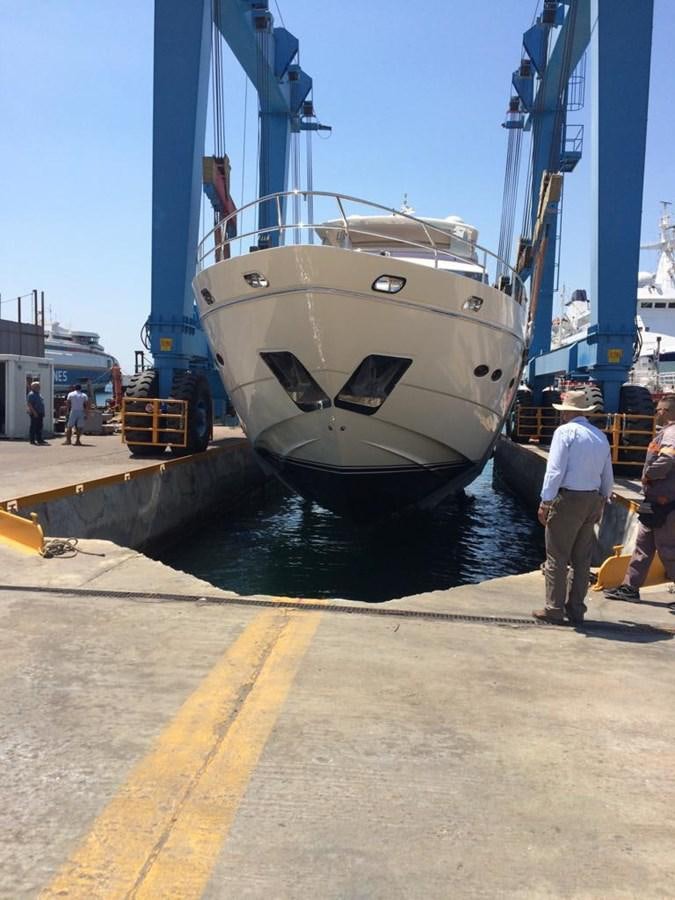 a boat docked at a pier aboard ASPIRATION Yacht for Sale