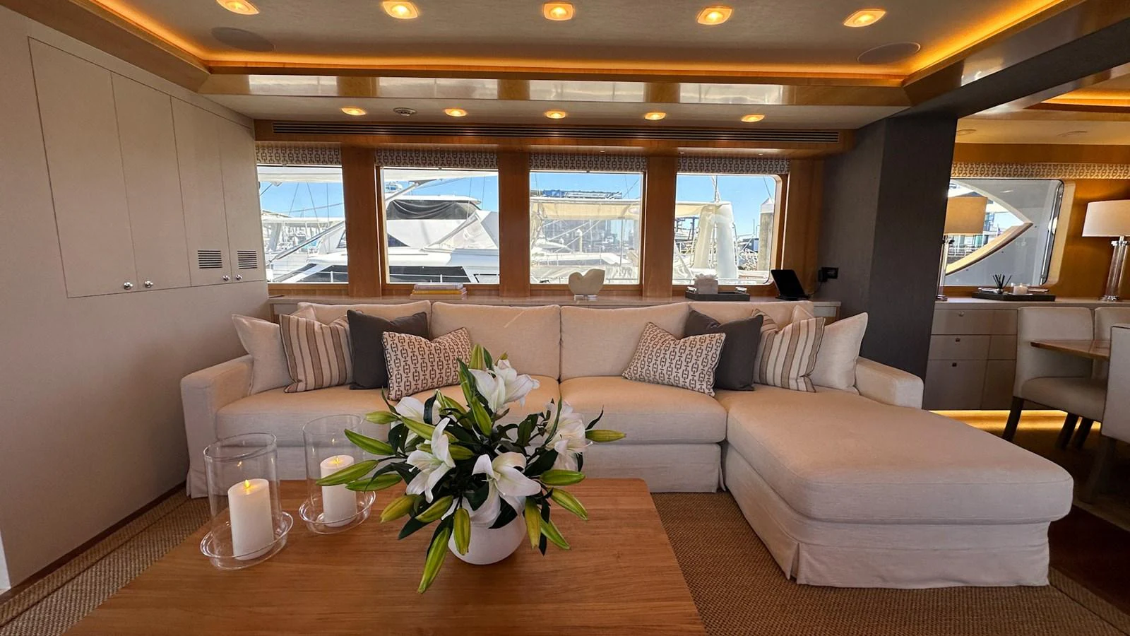 a living room with a couch and a table aboard SALVATOR II Yacht for Sale