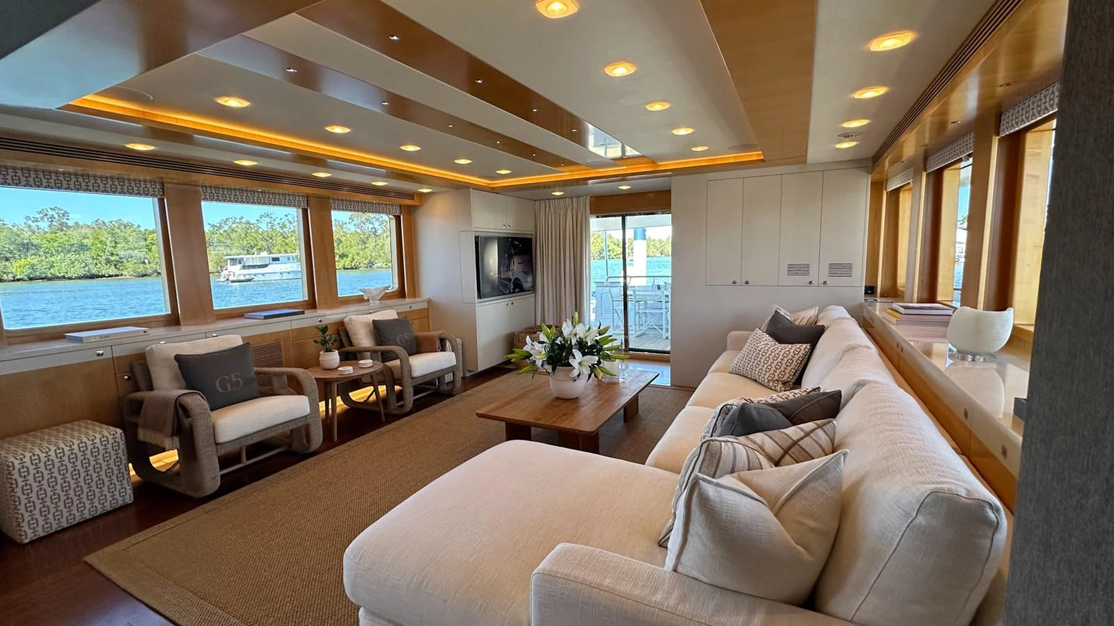 a living room with a large window aboard SALVATOR II Yacht for Sale