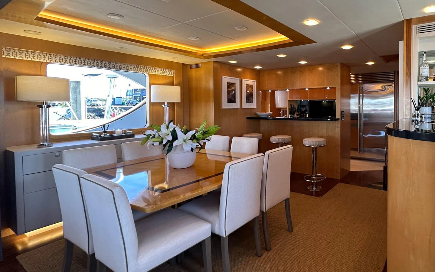 a large kitchen with a dining table aboard SALVATOR II Yacht for Sale