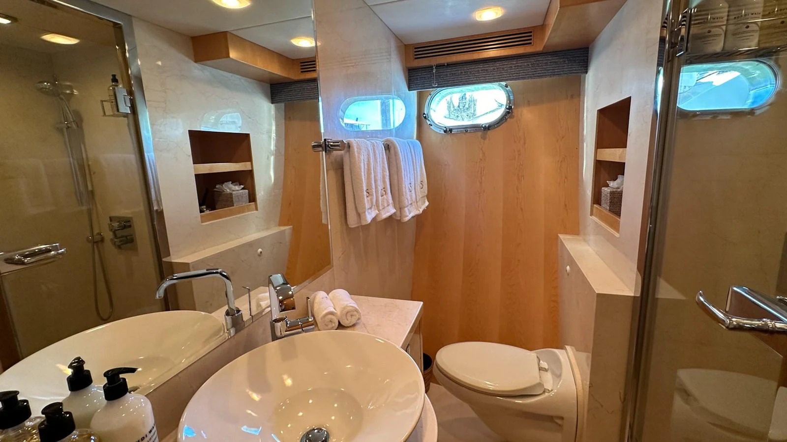 a bathroom with a large mirror aboard SALVATOR II Yacht for Sale
