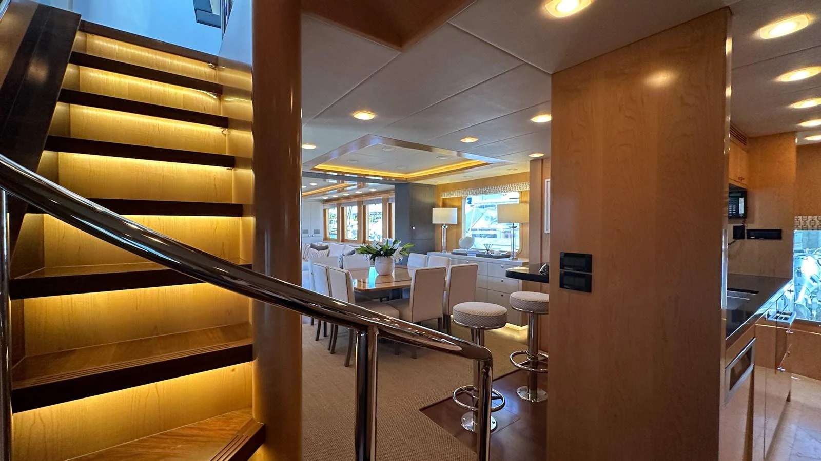 a room with a table and chairs aboard SALVATOR II Yacht for Sale