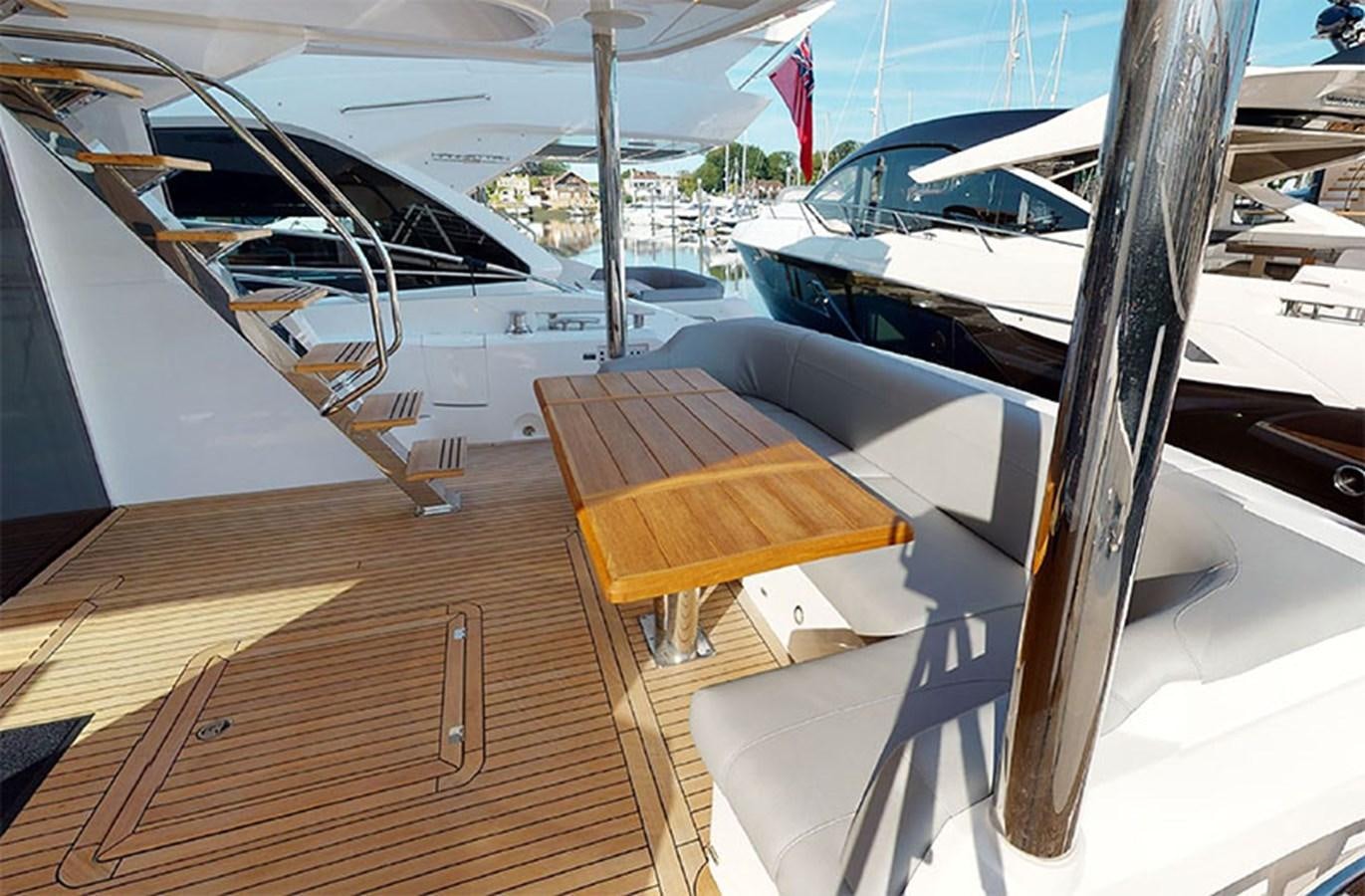 a boat on a deck aboard SM Yacht for Sale