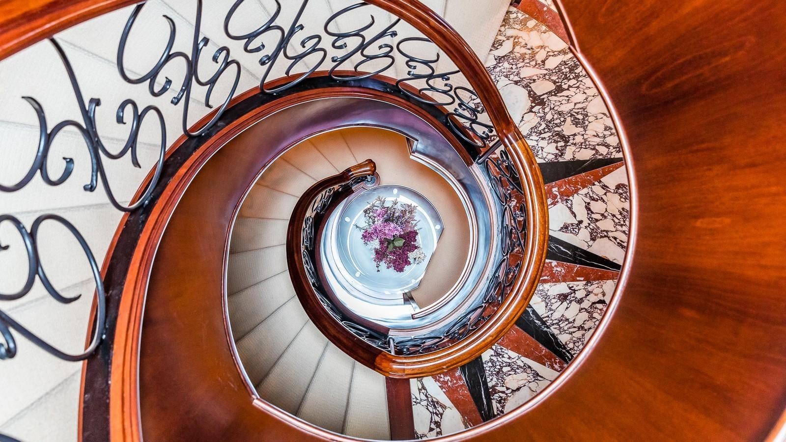 a high view of a staircase aboard BELLA Yacht for Sale