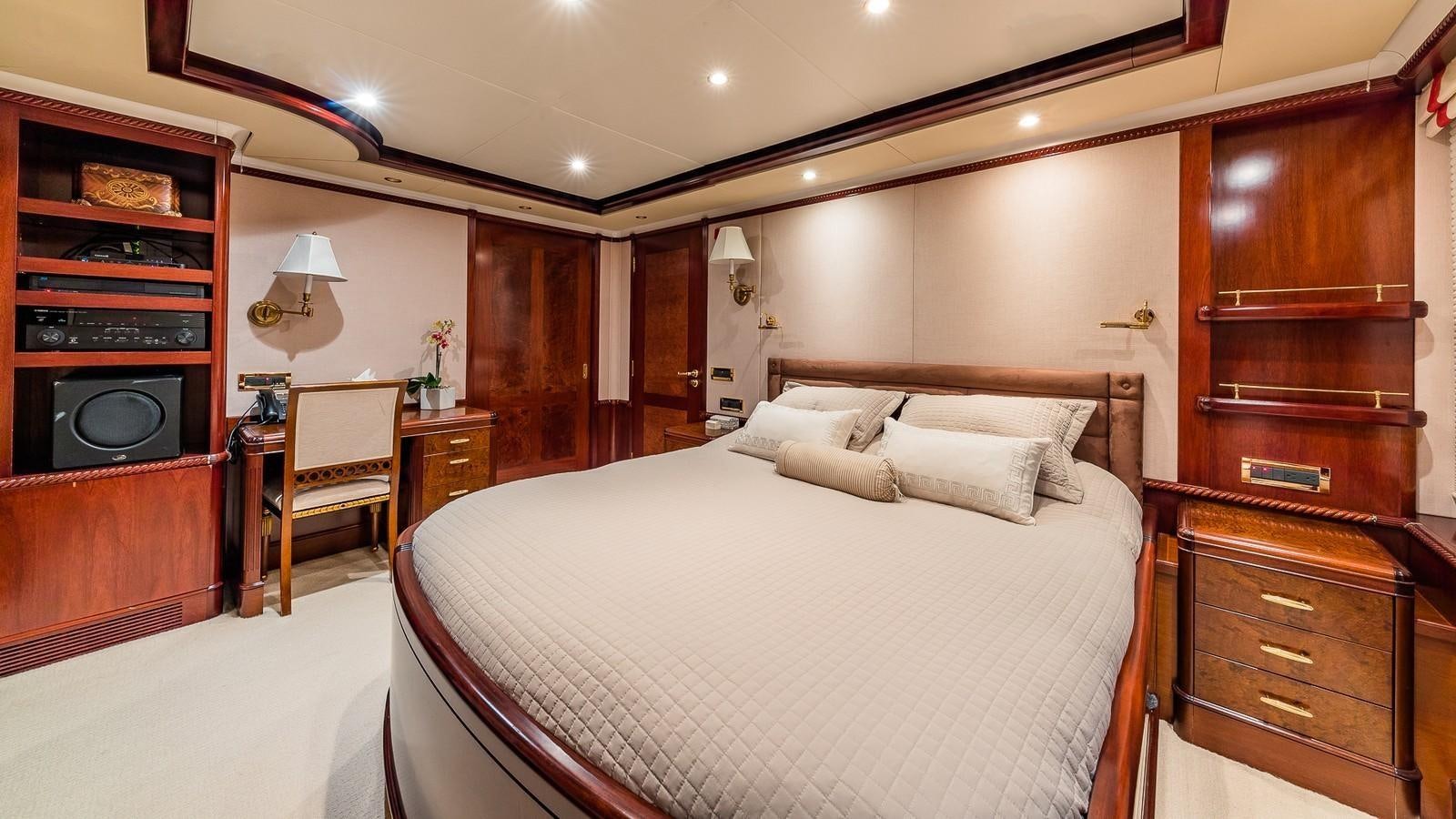 a bed in a room aboard BELLA Yacht for Sale