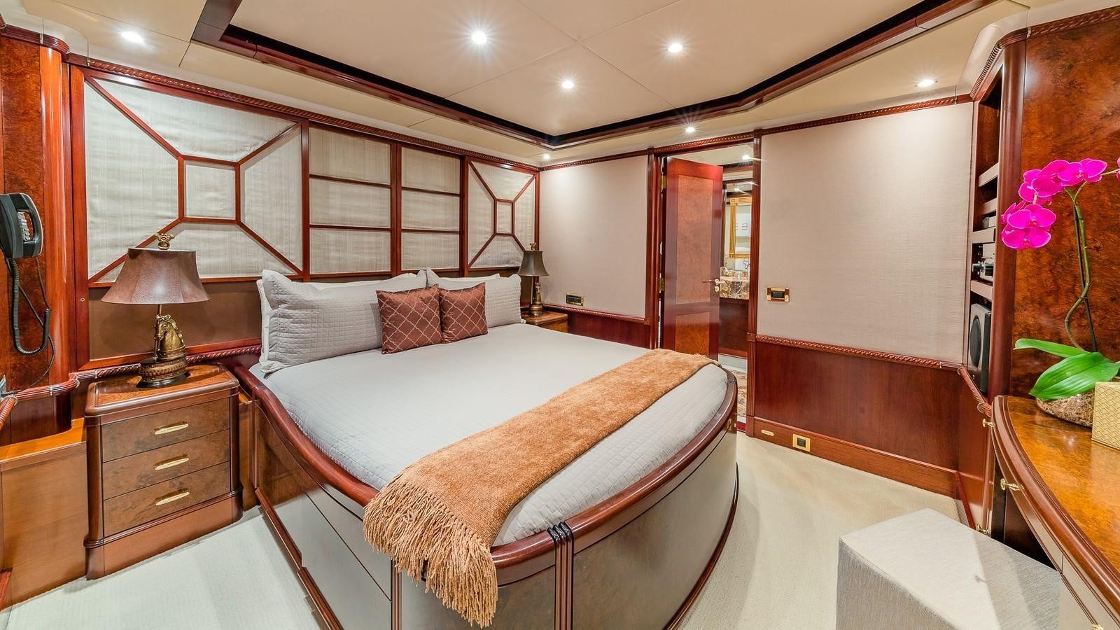 a bed in a room aboard BELLA Yacht for Sale