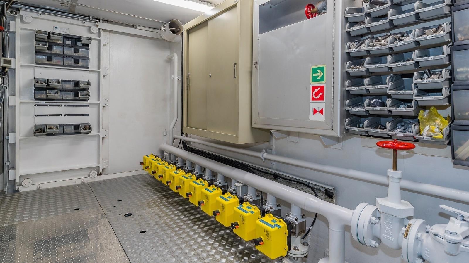 a room with shelves and equipment aboard BELLA Yacht for Sale