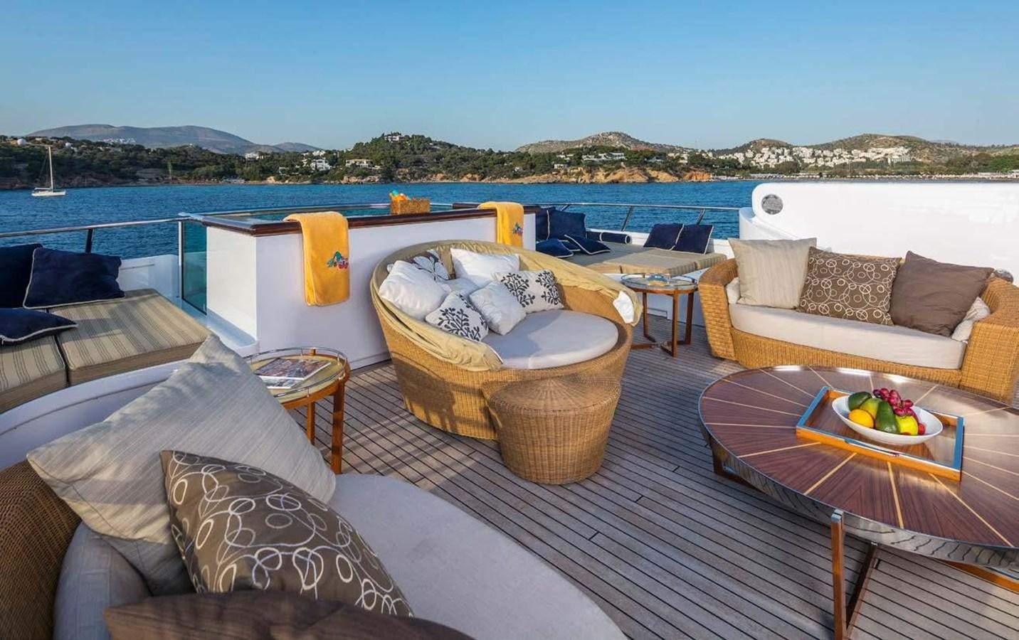 a room with a couch and a table and a bed aboard PEGASUS Yacht for Sale