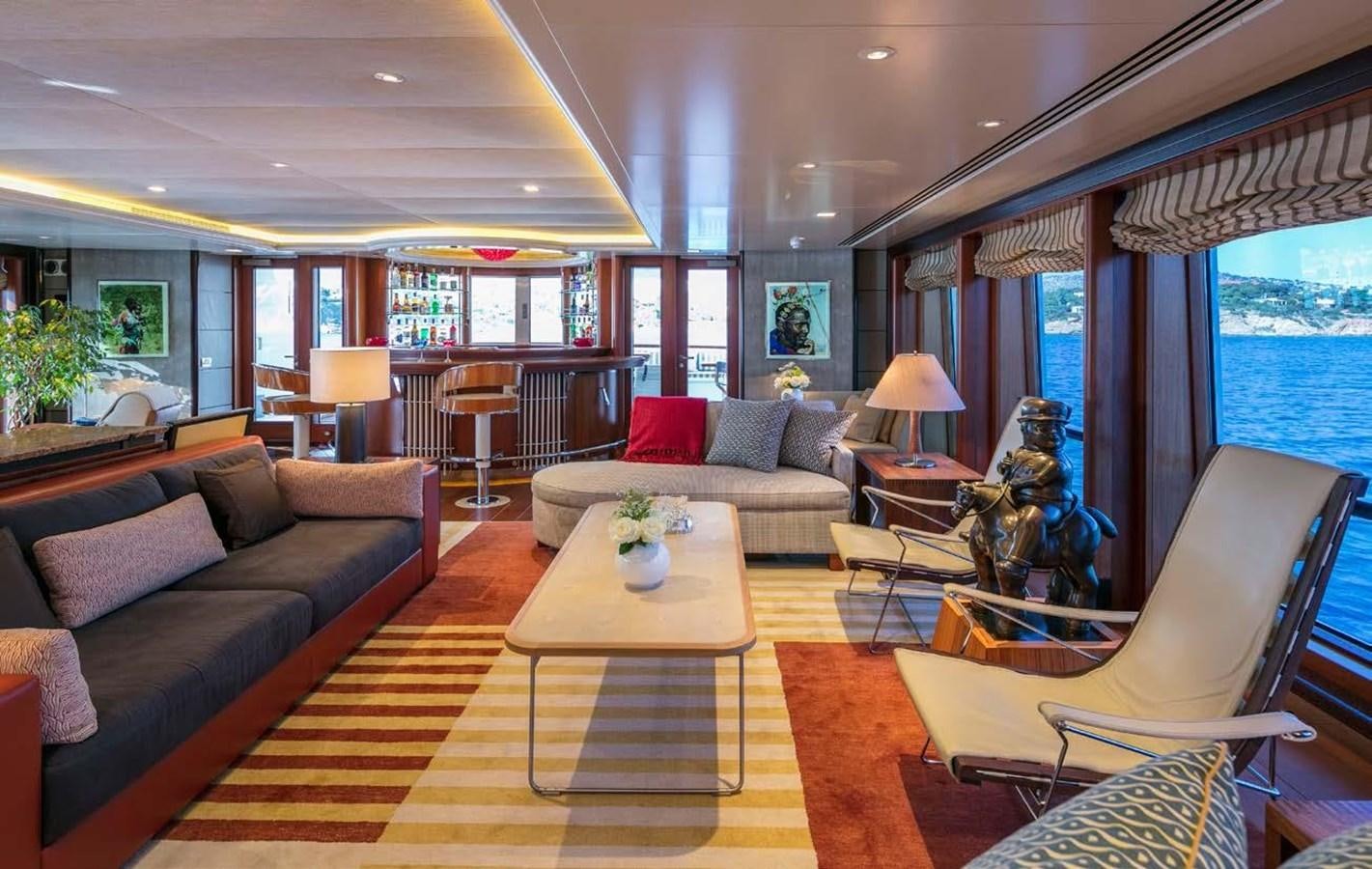 a living room with a large window aboard PEGASUS Yacht for Sale