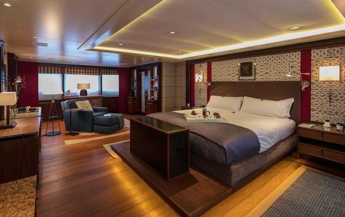 a large bedroom with a large bed aboard PEGASUS Yacht for Sale