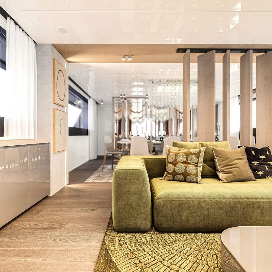 a living room with a couch and a large mirror aboard TERRANOVA 45 Yacht for Sale