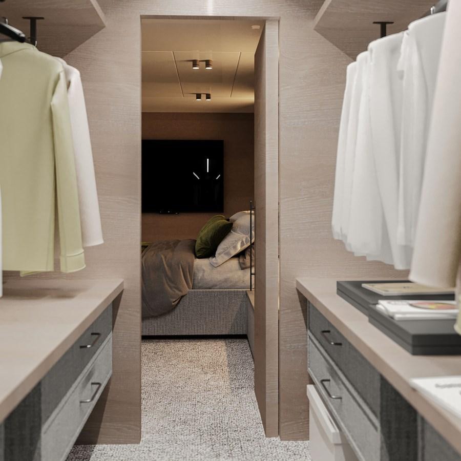 a room with a bed and desk aboard TERRANOVA 45 Yacht for Sale