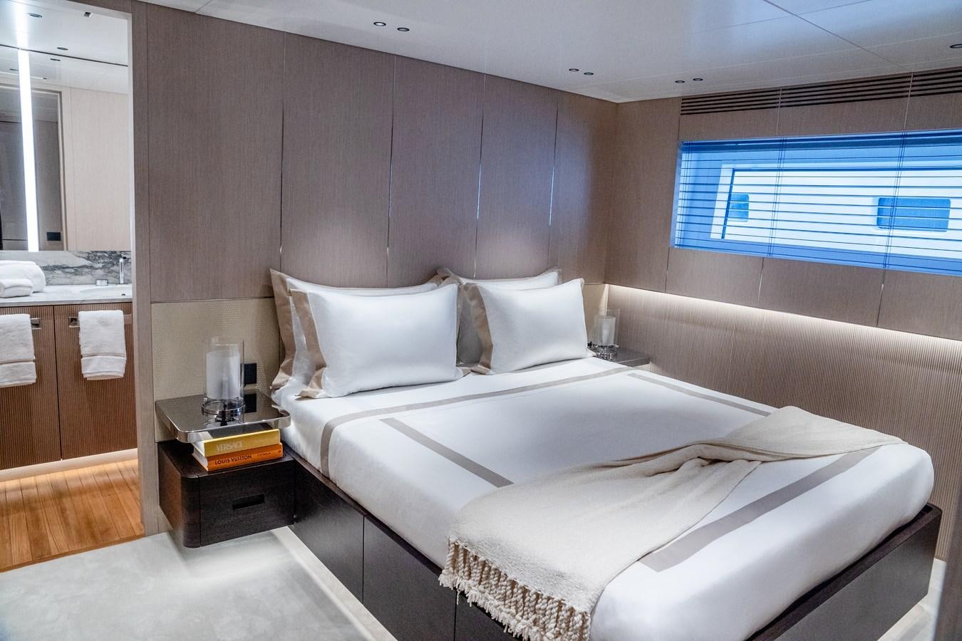 a bed in a room aboard TOSUN Yacht for Sale