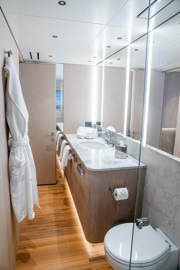 a bathroom with a sink and a toilet aboard TOSUN Yacht for Sale