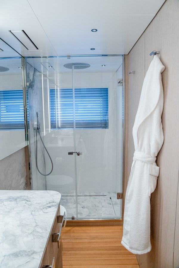 a white towel on a swinger aboard TOSUN Yacht for Sale