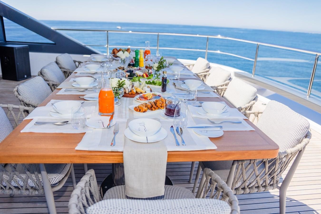 a table with food on it aboard TOSUN Yacht for Sale