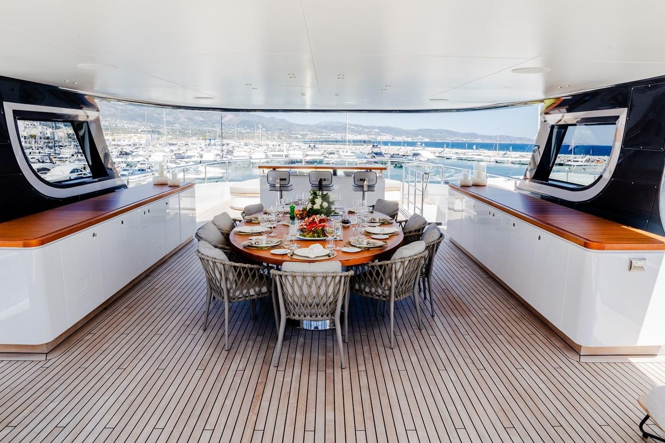 a dining table on a boat aboard TOSUN Yacht for Sale