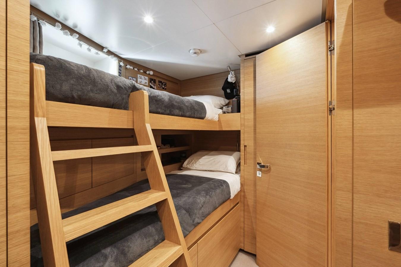 a bunk bed in a room aboard GLOBAS Yacht for Sale