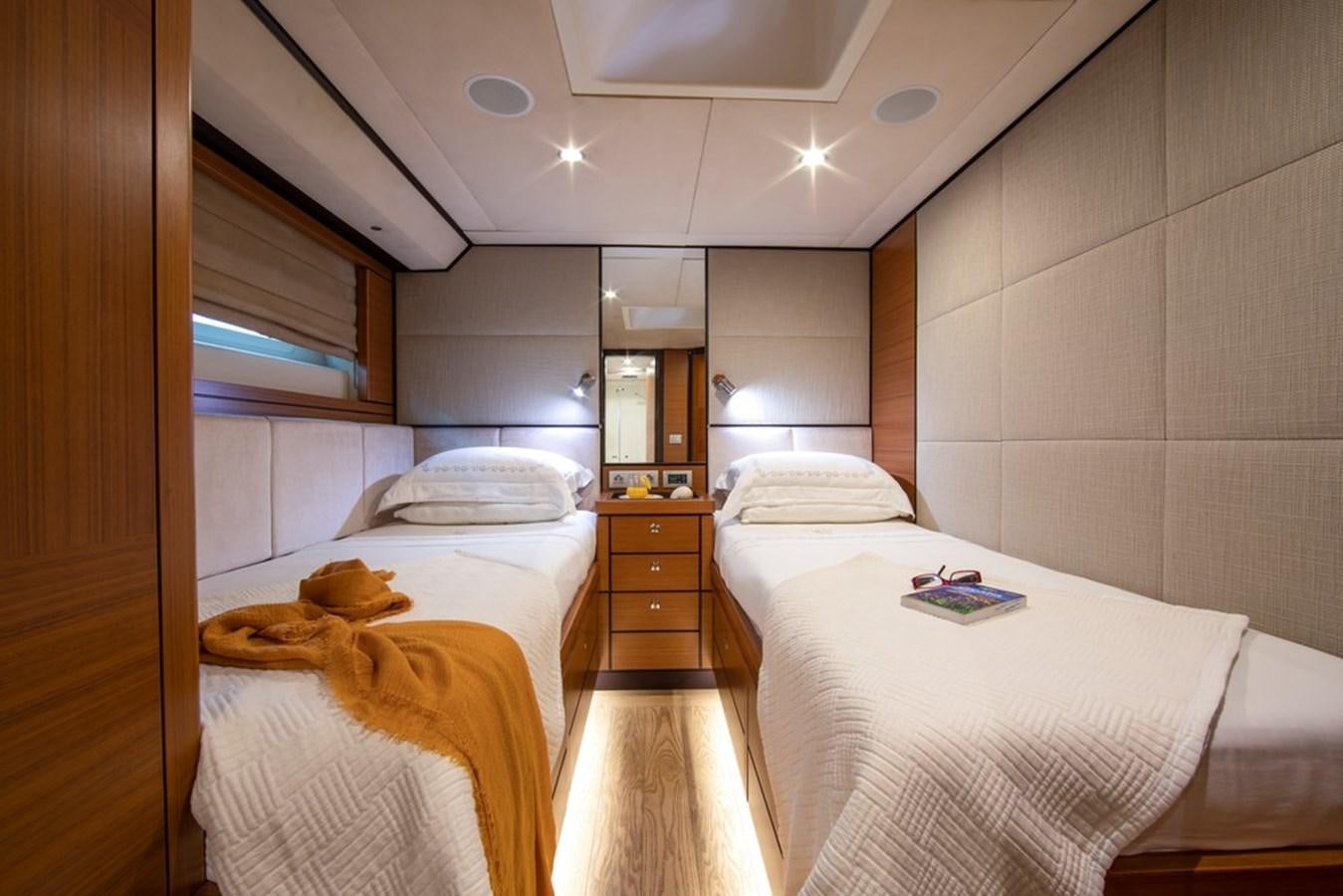 a room with two beds aboard PATEA Yacht for Sale