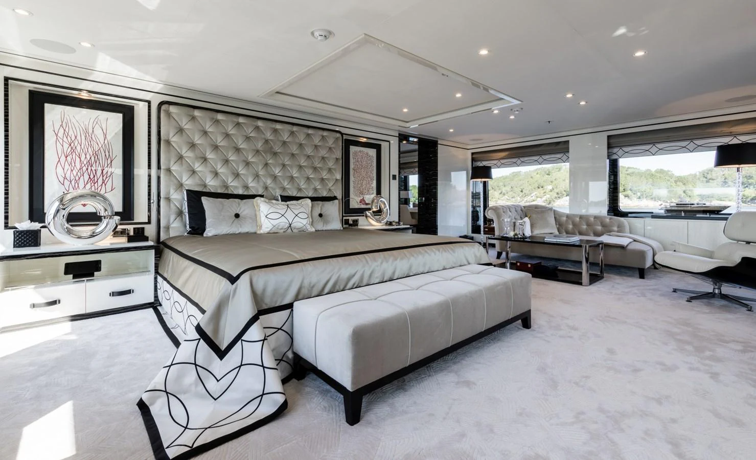 a large bedroom with a large bed aboard LILI Yacht for Sale