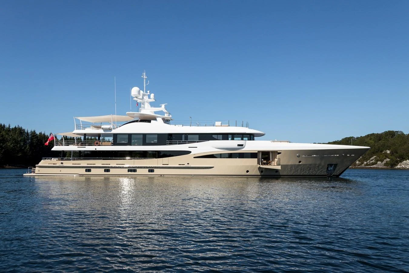 a large ship in the water aboard LILI Yacht for Sale