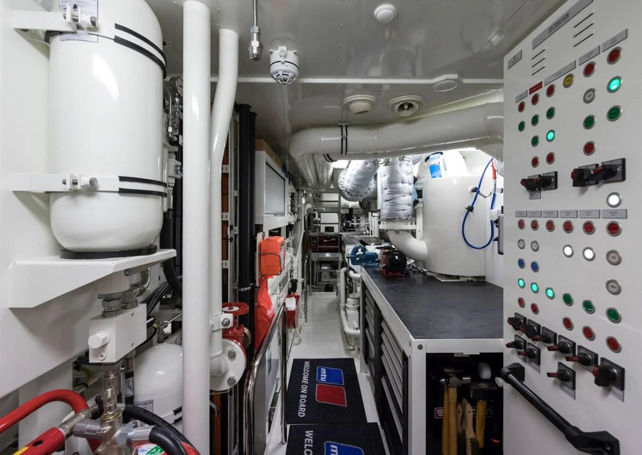 a room with a machine and equipment aboard LILI Yacht for Sale
