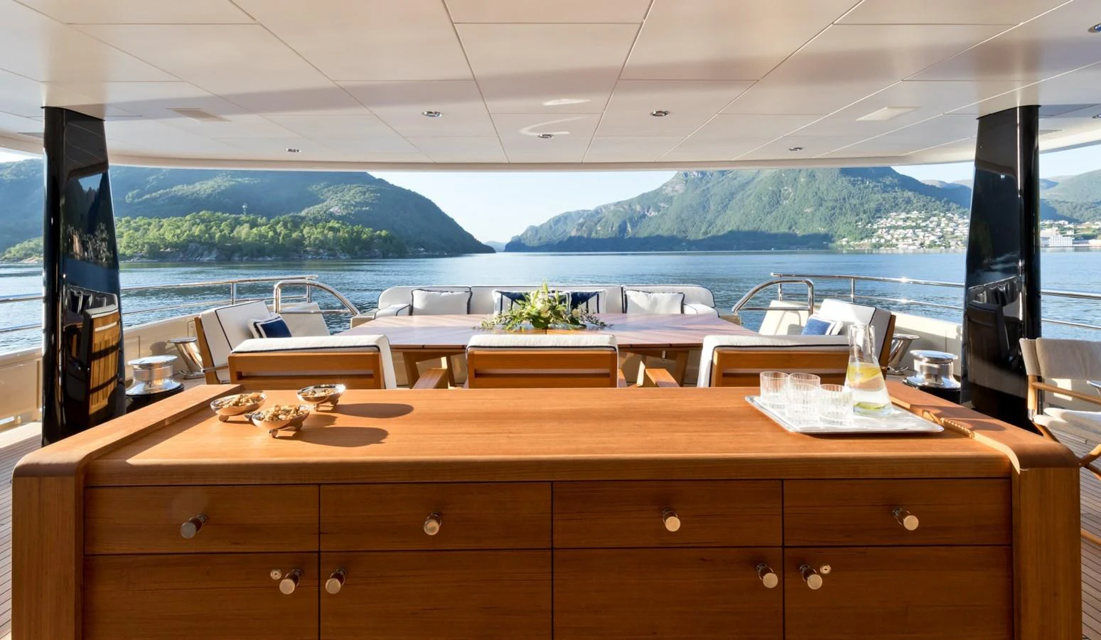 a kitchen with a view of the mountains aboard LILI Yacht for Sale