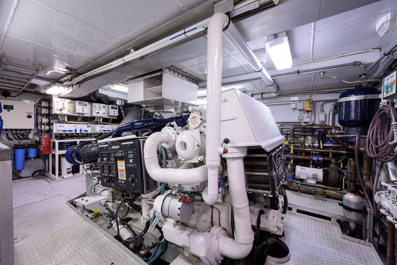 a large white machine in a factory aboard IMPETUOUS Yacht for Sale